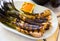 Grilled calcots with romesco sauce