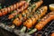 Grilled carrots in a herbal marinade on a grill plate, outdoor, top view. Grilled vegetarian food