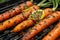 Grilled carrots in a herbal marinade on a grill plate, outdoor, top view. Grilled vegetarian food