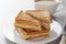 Grilled cheese sandwich of wholegrain bread with coffee for healthy breakfast.