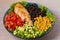 Grilled chicken with avocado, tomatoes, sweet corn, beans and lettuce. Southwestern colorful chicken salad with creamy cilantro dr