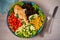 Grilled chicken with avocado, tomatoes, sweet corn, beans and lettuce. Southwestern colorful chicken salad with creamy cilantro dr