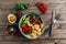 Grilled chicken with orecchiette pasta, fresh tomato and basil leaves