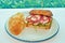 grilled chicken sandwich, with lettuce, sliced tomato, onions and potato chips