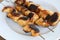 Grilled chicken skewers on a plate