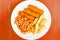 Grilled Cod Fish Fingers With Chunky Chips And Baked Beans in Tomato Sauce