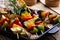 Grilled colorful vegetables skewers, vegan meal