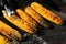 Grilled Corn for sale on the street. Corn baked with herbs and spices.