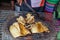 Grilled Cuttlefish on a charcoal stove. Grilled squid is very tasty.Can found at street food,Thailand. BBQ Grill On Hot Charcoal.