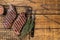 Grilled denver beef meat steak. Wooden background. Top view. Copy space
