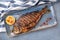 Grilled dorado. Natural delicious food. Greek cuisine menu. Still life in a marine style