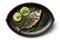 grilled fish served with lemon and herbs