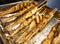 Grilled fish on wooden sticks