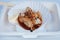 Grilled giant Hokkaido scallop takeaway with chopsticks