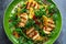 Grilled Halloumi Cheese salad with orange, rocket leaves, pomegranate and pumpkin seed. healthy food