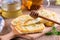 Grilled haloumi cheese with herbs on a cutting board