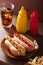 Grilled hot dogs with mustard ketchup and french fries