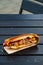 Grilled hot dogs with mustard, ketchup on a picnic table