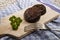 Grilled irish black pudding made with oatmeal on a wooden board