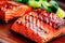 Grilled juicy orange salmon fish dish closeup. Delicious seafood meal.