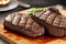 Grilled juicy stakes on a chopping board surface