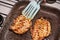 Grilled juicy steak with spices on a grill pan, the girl turns over with a spatula on the stove