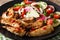 grilled king oyster mushrooms with sesame seeds and fresh vegetable salad close-up. horizontal