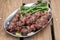 Grilled lamb kebabs with broccolini