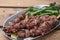 Grilled lamb kebabs with broccolini