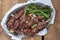 Grilled lamb kebabs with broccolini