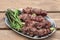 Grilled lamb kebabs with broccolini