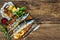 Grilled mackerel fish with baked potatoes