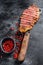 Grilled marbled beef steak. Black background. Top view