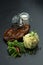 Grilled meat with potatoes. Photo of food on a dark background