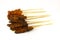 Grilled Meats Skewered on Bamboo Sticks