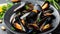 Grilled mussels on black plate, a delectable traditional mediterranean seafood delicacy