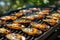 Grilled mussels on elegant black plate, a traditional mediterranean seafood delicacy