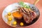 Grilled New Zealand lamb chops with roasted sweet potatoes, natural sauce flavored with herbs