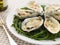 Grilled Oysters with Mornay Sauce on Samphire