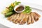 Grilled pork eat with thai spicy salty sauce decorate with vegetable