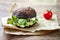 Grilled portobello bun mushroom burger. Vegan, gluten free, grain free, healthy veggies hamburger with guacamole, fresh vegetables