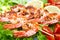 Grilled prawns with salad and cherry tomatoes