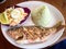 Grilled red snapper with rice and cole slaw.