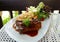 Grilled rib steak serving with french fried and lettuce salad