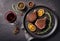 Grilled ribeye beef steak with red wine, herbs and spices, food advertisement photo,