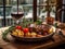 Grilled Ribeye Steak with truffle butter and herbs, garnished with rosemary spig, served with baked potatoes, cherry tomatoes and
