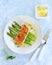 Grilled salmon filet with steamed asparagus