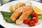 Grilled salmon with green asparagus, cherry tomato and potatoes