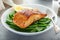 Grilled salmon served with green beans