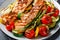 Grilled salmon and vegetables on a plate